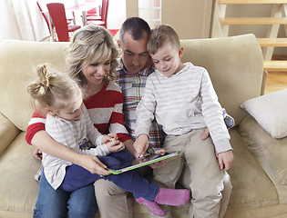 Image showing happy young family at home