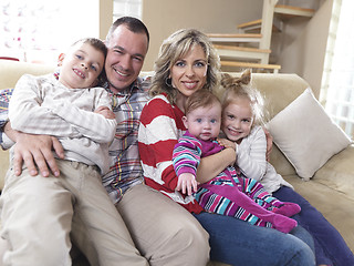 Image showing happy young family at home