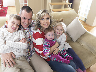 Image showing happy young family at home