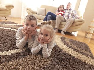 Image showing happy young family at home