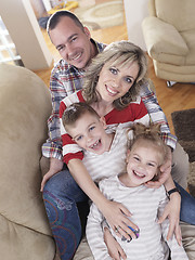 Image showing happy young family at home