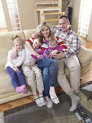 Image showing happy young family at home