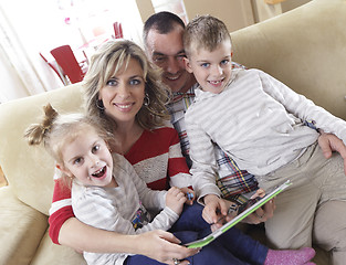 Image showing happy young family at home