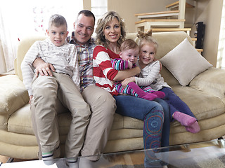 Image showing happy young family at home