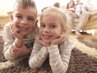 Image showing happy young family at home