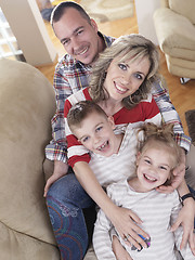 Image showing happy young family at home