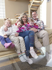 Image showing happy young family at home