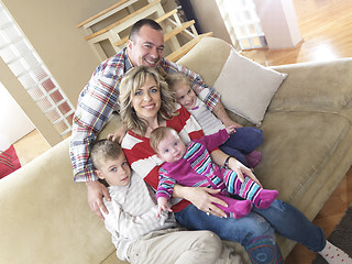 Image showing happy young family at home