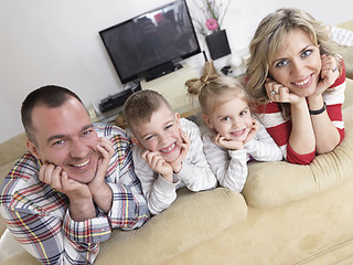 Image showing happy young family at home