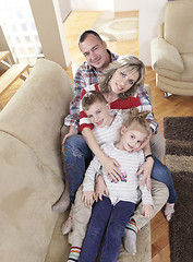 Image showing happy young family at home