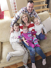Image showing happy young family at home