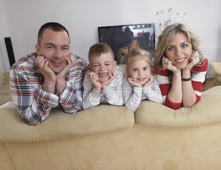 Image showing happy young family at home