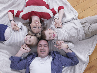 Image showing happy young family at home