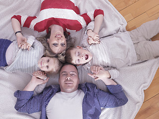 Image showing happy young family at home