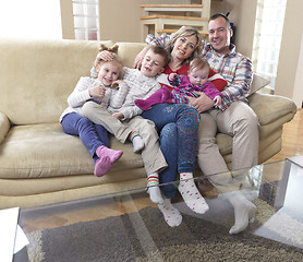 Image showing happy young family at home