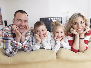 Image showing happy young family at home