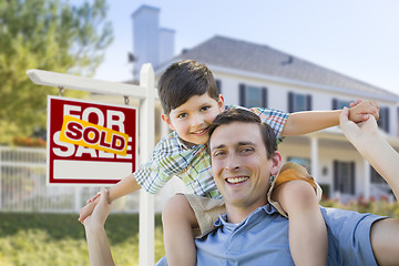 Image showing Mixed Race Father, Son Piggyback, Front of House, Sold Sign