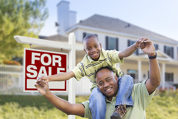 Image showing African American Father and Son, Sale Sign and Home