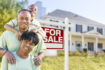 Image showing African American Family In Front of Sale Sign and House