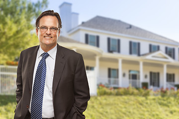 Image showing Attractive Businessman In Front of Nice Residential Home