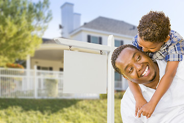 Image showing African American Father and Mixed Race Son, Blank Sign, House