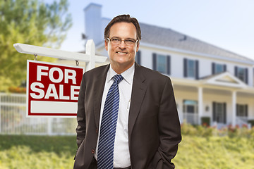 Image showing Real Estate Agent in Front of For Sale Sign, House