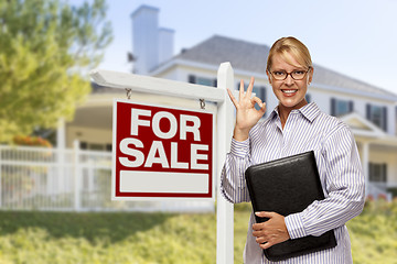 Image showing Real Estate Agent in Front of For Sale Sign, House