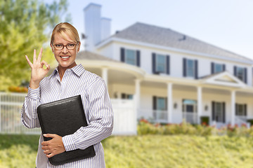 Image showing Attractive Businesswoman In Front of Nice Residential Home