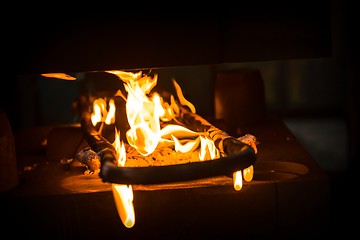 Image showing Fire burning on steel