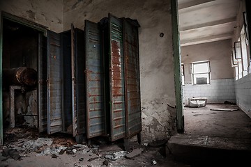 Image showing Dark room with steel lockers