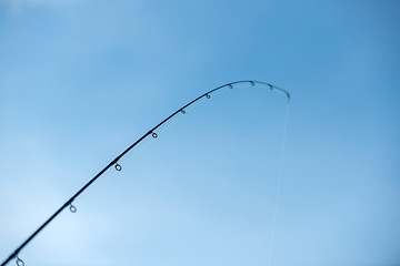 Image showing Modern clean fishing rod outdoors