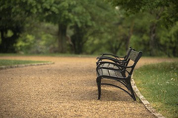 Image showing Stylish bench in autumn park