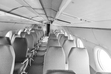 Image showing Interior of an airplane with many seats
