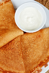 Image showing pancakes with sour cream