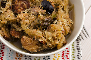 Image showing traditional polish sauerkraut (bigos) with mushrooms and plums