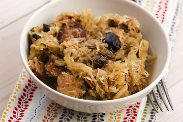 Image showing traditional polish sauerkraut (bigos) with mushrooms and plums