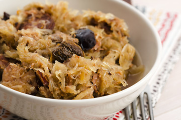 Image showing traditional polish sauerkraut (bigos) with mushrooms and plums