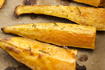 Image showing Portion of fresh baked sweet potato wedges