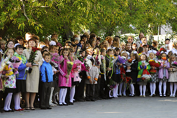 Image showing September 1. A solemn ruler of pupils in the school yard.