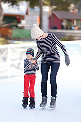 Image showing family ice skating