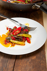 Image showing fried chili pepper and vegetable on a wok pan