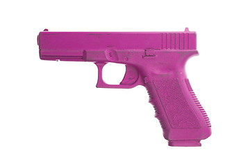 Image showing Dirty pink training gun isolated on white