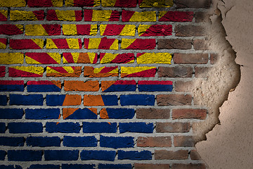 Image showing Dark brick wall with plaster - Arizona