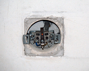 Image showing Dismantled socket on the wall