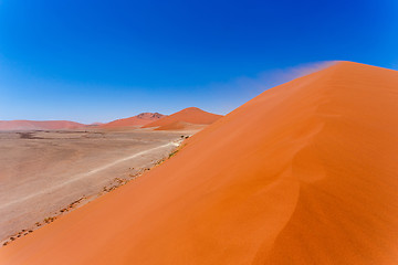 Image showing Dune 45 in sossusvlei Namibia, view from the top of a Dune 45 in sossusvlei Namibia, view from the top of a dune