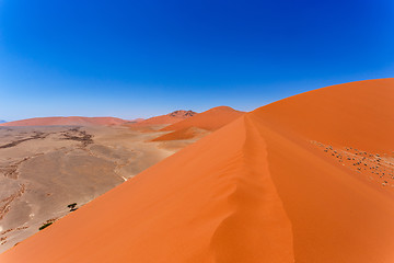 Image showing Dune 45 in sossusvlei Namibia, view from the top of a Dune 45 in sossusvlei Namibia, view from the top of a dune