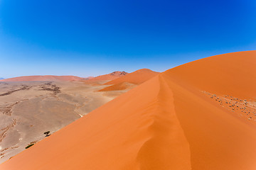 Image showing Dune 45 in sossusvlei Namibia, view from the top of a Dune 45 in sossusvlei Namibia, view from the top of a dune