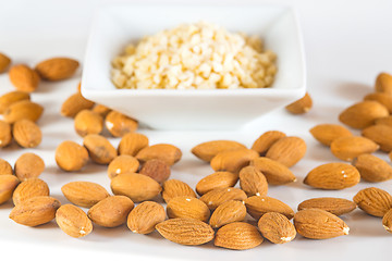 Image showing almonds, whole and minced