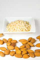 Image showing almonds, whole and minced