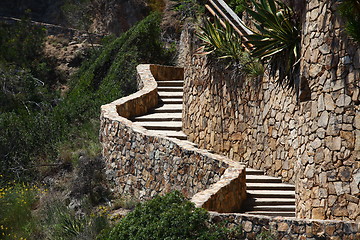 Image showing winding stone staircase in the mountains